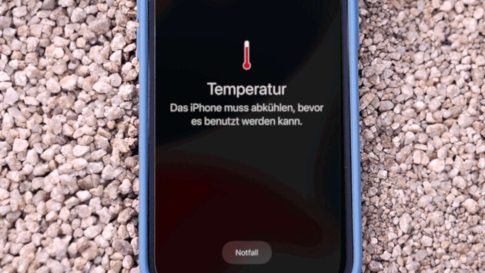 iPhone zeigt Überhitzung und Kühlungsanweisung an.