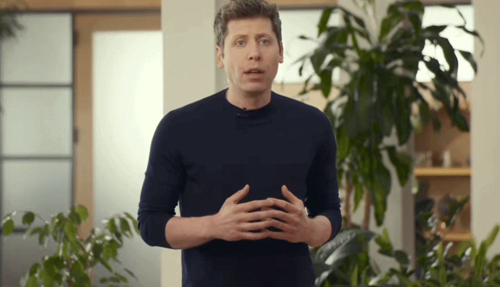 Mann spricht in einem modernen Raum.